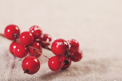 Close-up of cherries on table