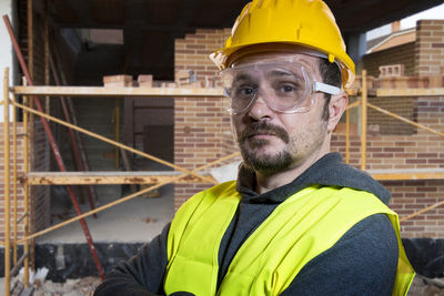 Portrait of confident architect at construction site