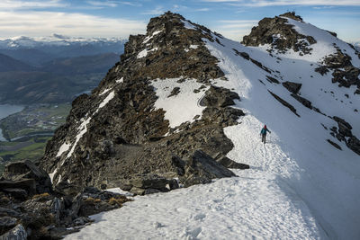 Alpine hiking in snow covered mountains, the remarkables, new zealand