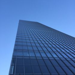 Low angle view of modern building against clear sky