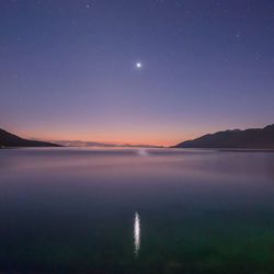 Scenic view of seascape at night