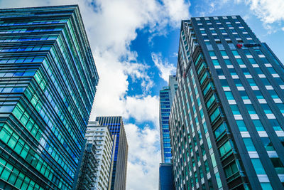 Low angle view of modern buildings against sky