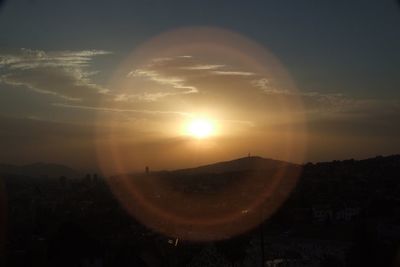 Scenic view of landscape against sky during sunset