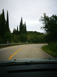 Country road passing through landscape