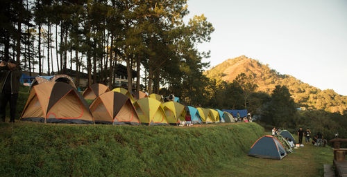 Panoramic view of tent on field against sky