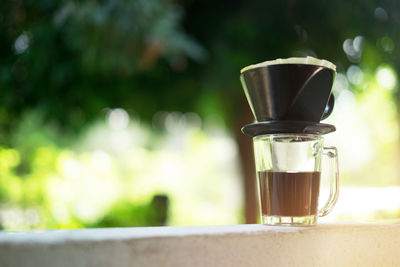 Close-up of coffee cup on table