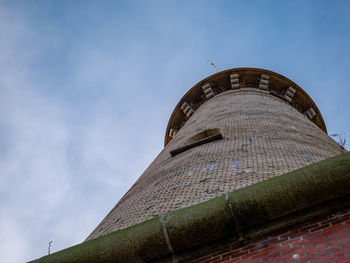 Low angle view of old building against sky