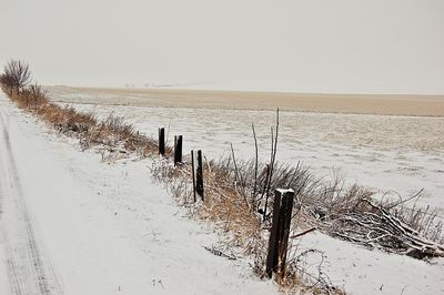 Scenic view of frozen sea against sky