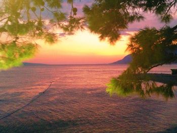 Scenic view of sea against sky during sunset