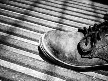 High angle view of shoes on wooden table