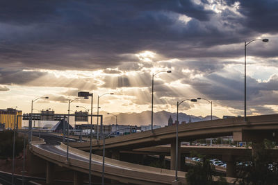 Bridges against cloudy sky