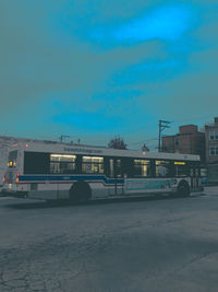 Road against blue sky in city