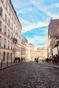 People walking in montmartre street in paris 