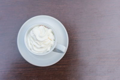 High angle view of cappuccino on table