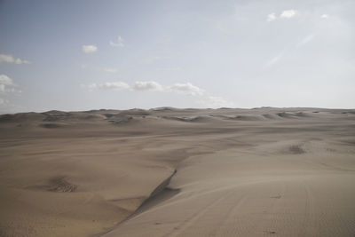Scenic view of desert against sky
