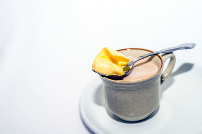 Close-up of ice cream against white background