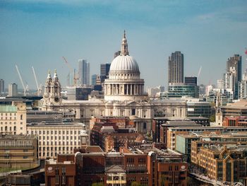 View of buildings in city against sky