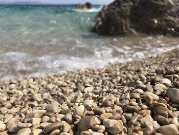 Close-up of stones on beach