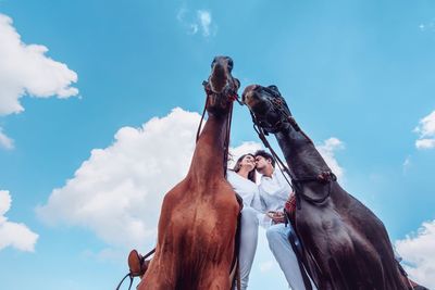 Low angle view of statue against sky