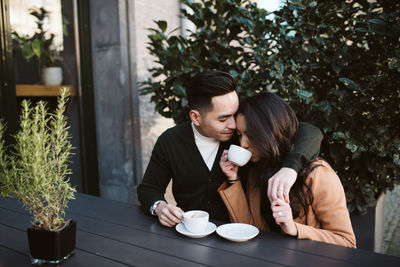 Young couple with coffee