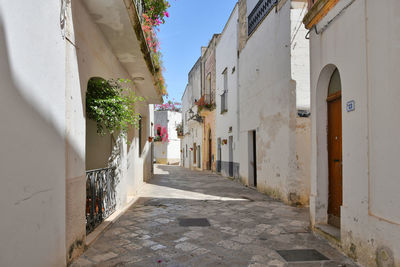 A street in the historic center of specchia, a medieval town in the puglia region, italy.