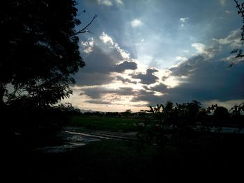 Scenic view of silhouette landscape against sky at sunset