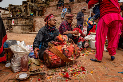 People working at street market