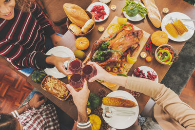 High angle view of people on table