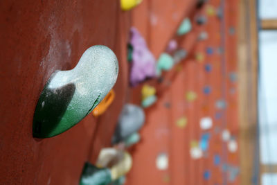 Close-up of grips on climbing wall