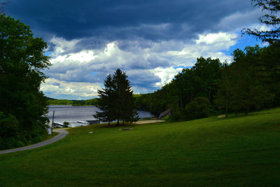 Scenic view of landscape against cloudy sky