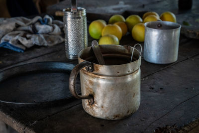 Close-up of fruits in container on table