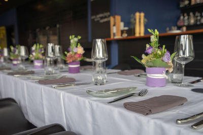 Flower pot on table in restaurant