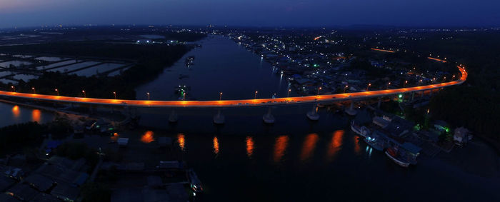 High angle view of illuminated cityscape at night