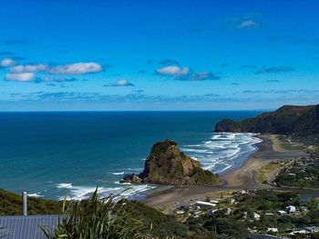 Scenic view of sea against blue sky