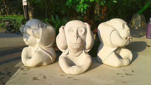 Close-up of statue on sand