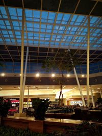 Illuminated shopping mall at night