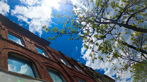 Low angle view of built structure against blue sky