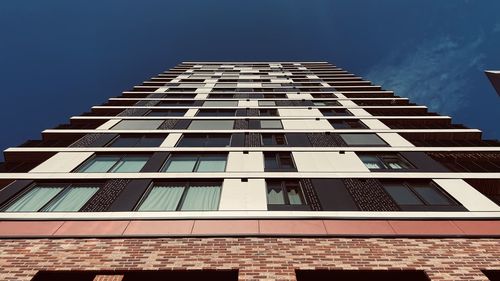 Low angle view of modern building against sky