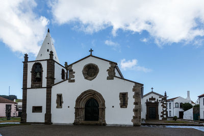 Facade of church against sky