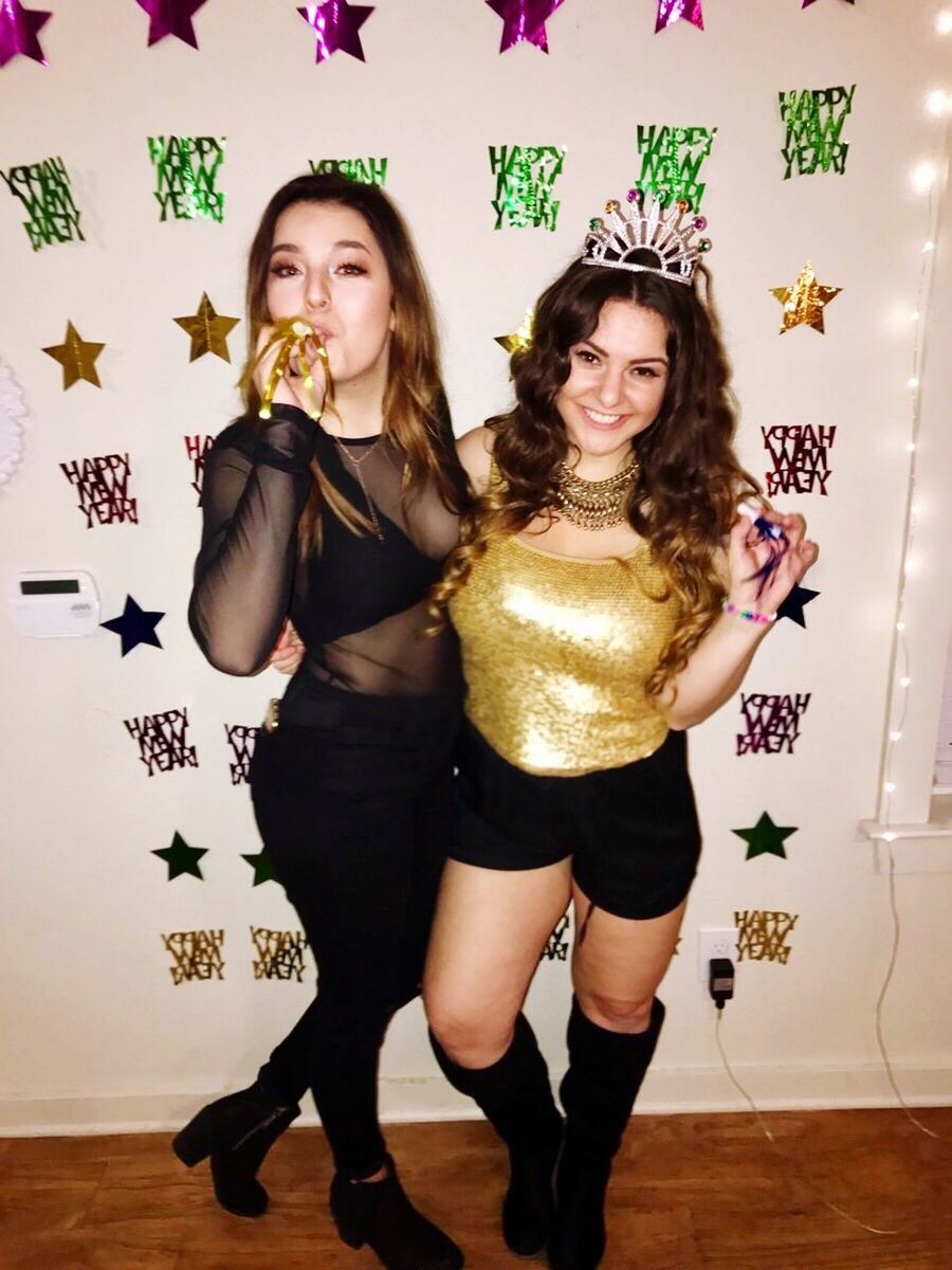 two people, young women, young adult, party - social event, full length, people, adults only, indoors, confetti, celebration, adult, domestic room, antler