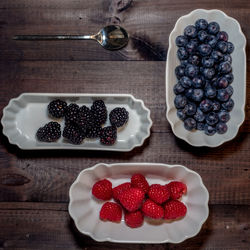 High angle view of strawberries in container on table