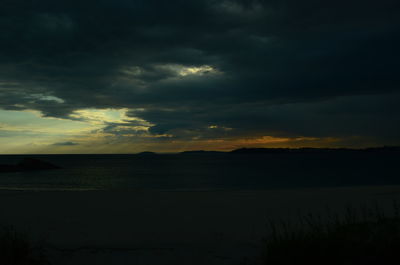 Scenic view of dramatic sky over land