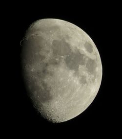 Close-up of moon against clear sky at night