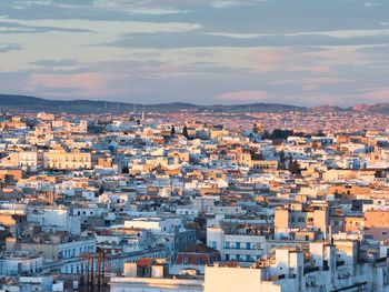 High angle view of townscape against sky at sunset