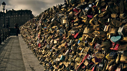 Padlocks on bridge railing