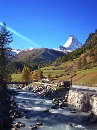 Landscape with mountain range in background