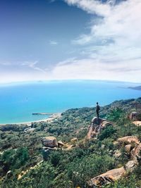 Scenic view of sea against cloudy sky