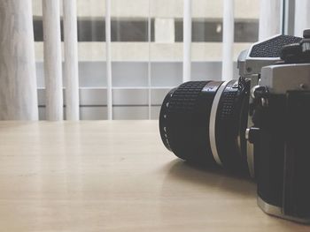 Close-up of camera on table