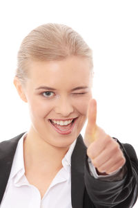 Portrait of a smiling young woman over white background