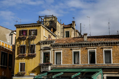 Low angle view of buildings against sky